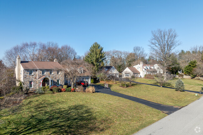 Stone Colonial homes mix with Cape Cods in Newlin.