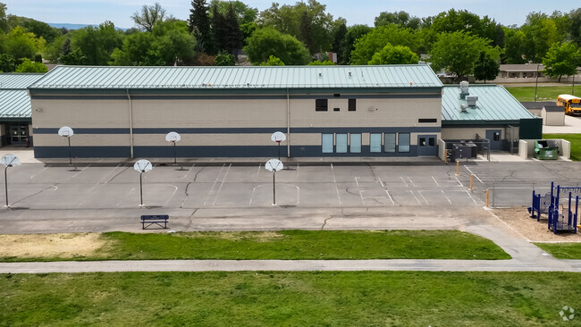 Students enjoy the open courts and acres of green space at Sherman Elementary for recess.