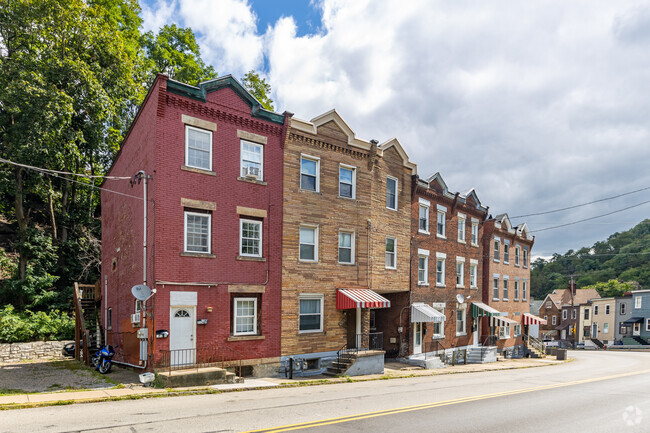 You can find three story row homes in South Side Slopes.