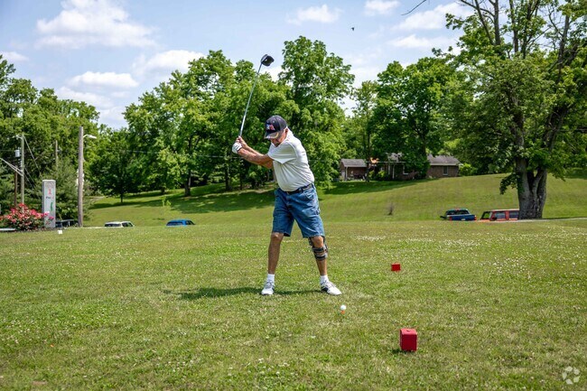 Practice your golf swing at the Franklin Golf Club by Manchester Meadows.
