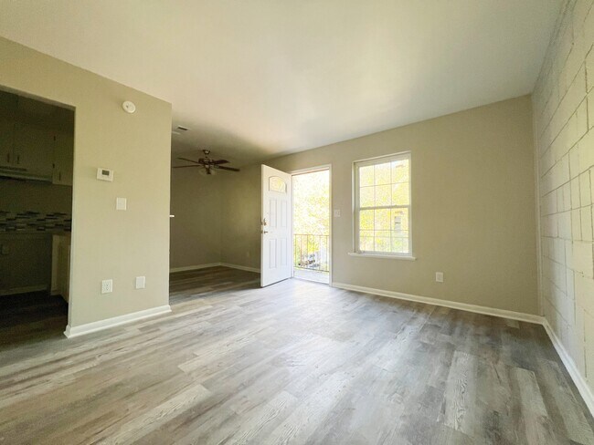 Step into a bright and sunny day from this inviting living room.
