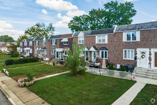 A charming row of homes, each with its unique character, nestled in Folcroft, PA.