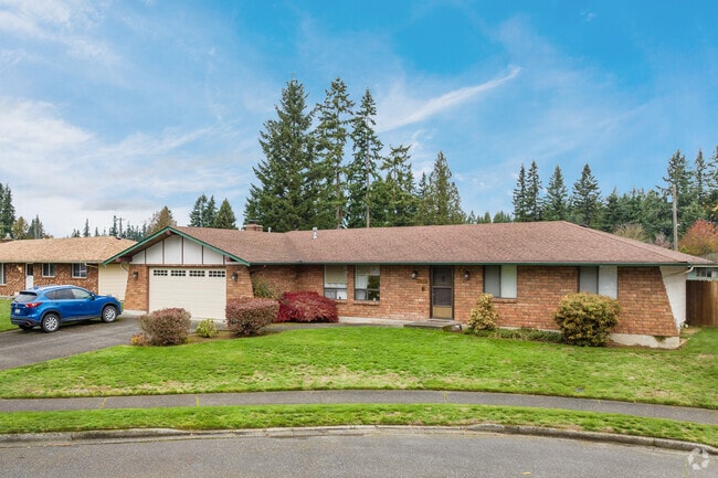 Smokey Point features ranch-style houses with brick and stone details.