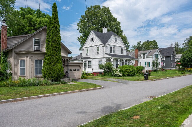 A row of homes showcases the wide variety of architectural styles found in Windsor.