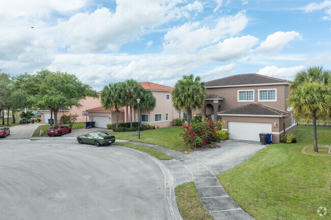 Experience vibrant living amidst a charming row of homes in Lauderdale Lakes.