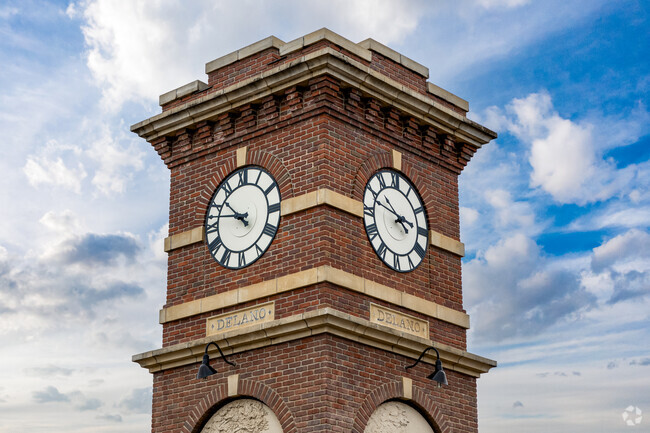 The iconic Delano clock tower represents the heart of the neighborhood.