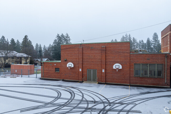 Adams Elementary offers two basketball hoops on the side of the building.