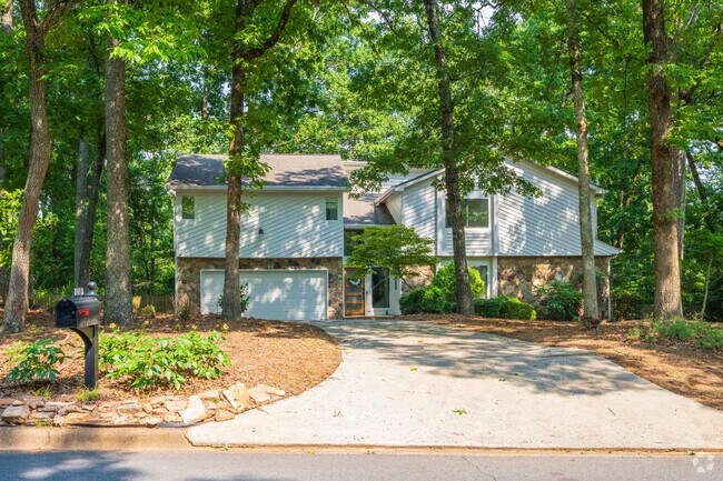 Many private homes sit on large lots and are surrounded by trees for shade and privacy.