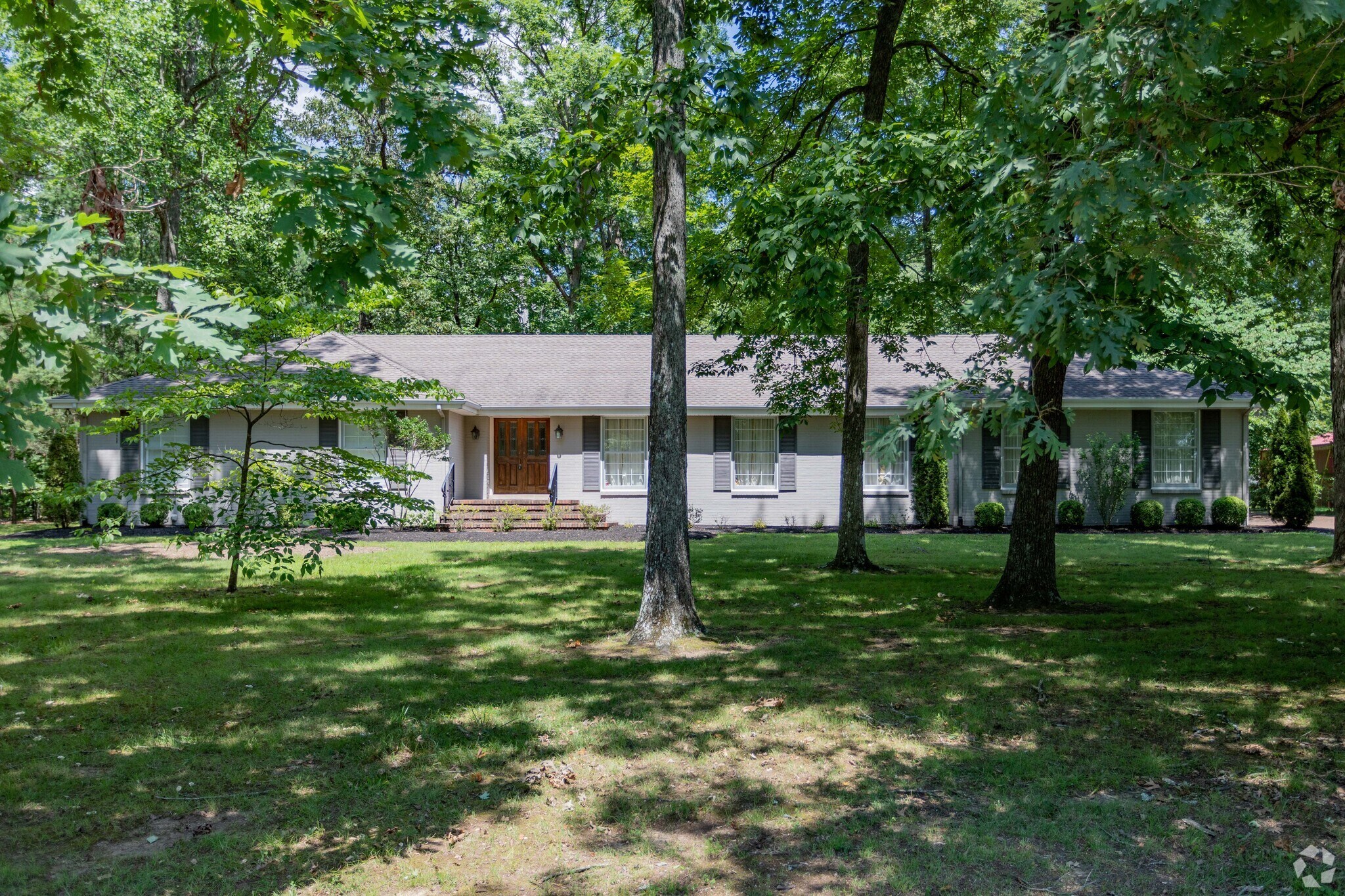 Single story homes are on heavily wooded lots in parts of Macon County.