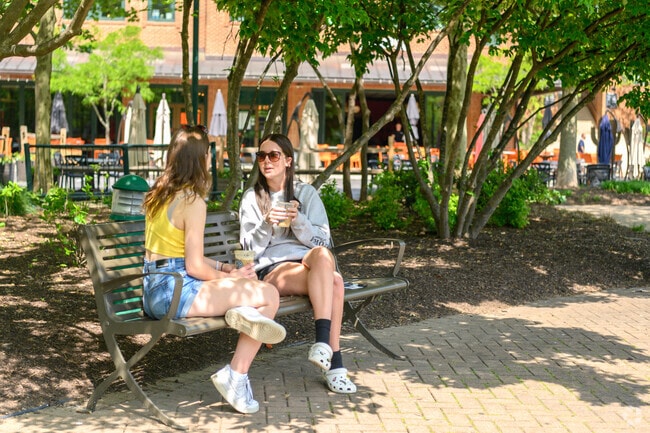 Eagleview's Town Square has shaded spots to sit and chill with friends.