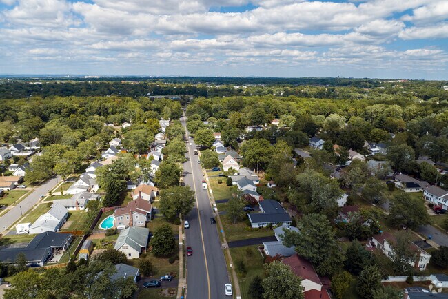 Greenbriar is neatly laid out and intermingled among trees.