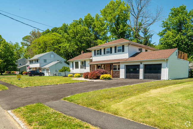 Family homes with spacious yards in West Caldwell.