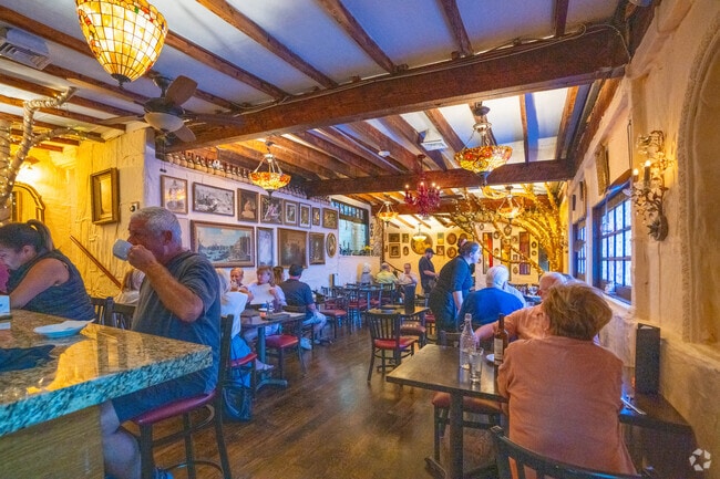 Enjoy the warm ambiance inside Antique Table near Chatham Street.