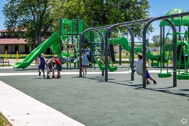 Kids love to run around at the Santa Fe Lake Park in Chanute.