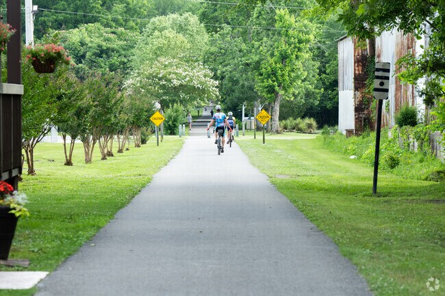 Chief Ladiga Trail is a 33-mile paved, multi-use trail in Alabama, primarily used for walking, biking, and other