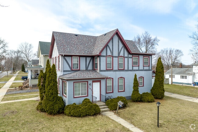 Tudor-style home in the Bardwell neighborhood with a large lawn.