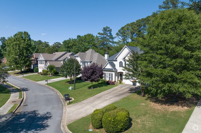 Spacious front yards in Sandy Plains are ideal for landscaping and shadey trees.
