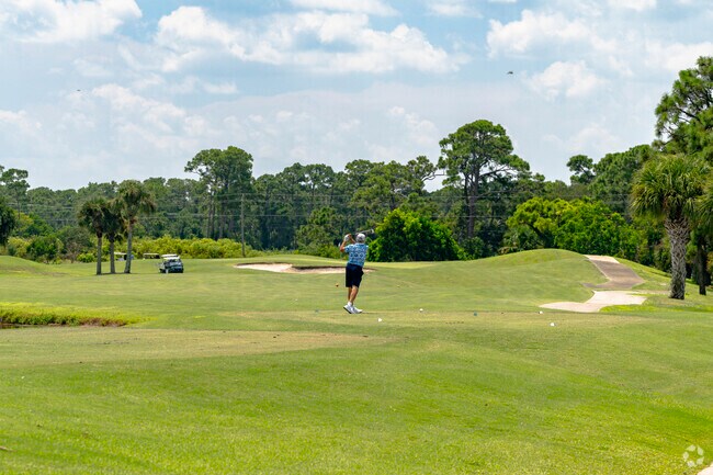 Play one of the two 18-hole courses at Sandridge Golf Club in Winter Beach.