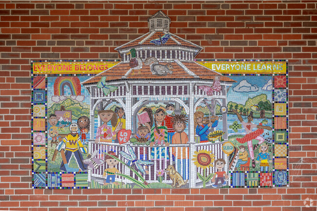 An artful mural sits on the facade of William Seach Primary School in Weymouth.