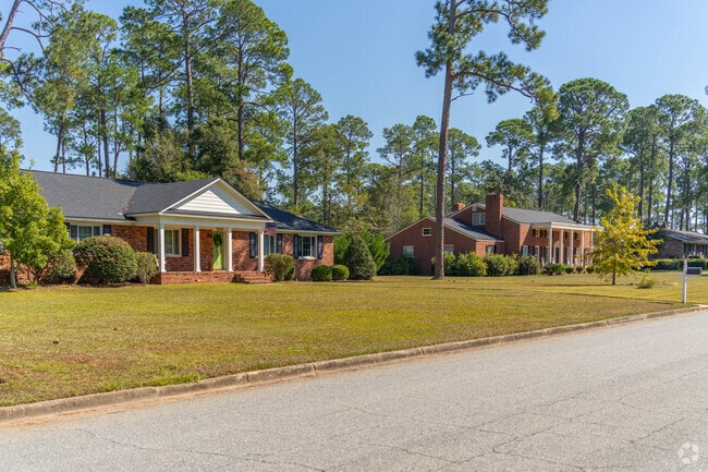 Family homes with large lawns are common in Green Acres.