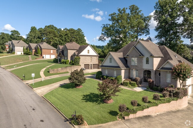 Take in the mature trees found around many homes in McCalla.