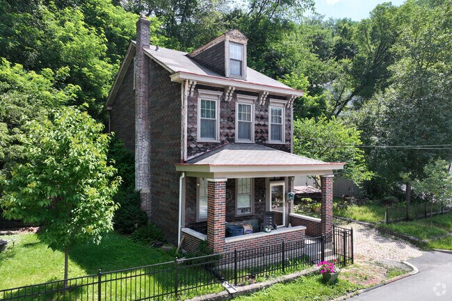 In Spring Garden, the Italianate house may showcase decorative corbels. A beautiful home.