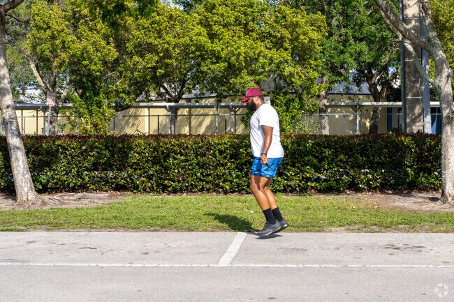 Part of daily life in Myrtle Grove is jump roping in the sunlight.