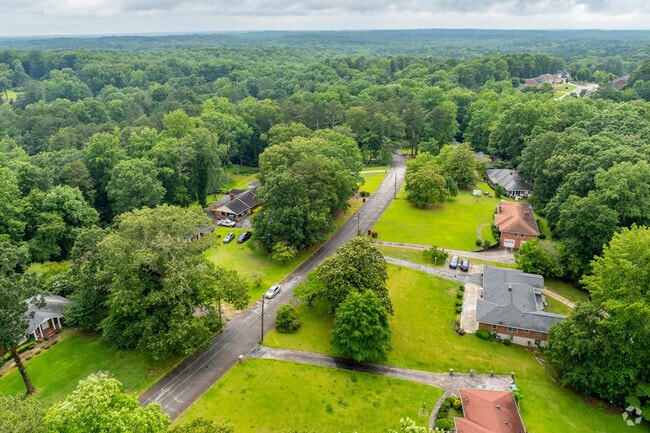 Audubon Forest is surrounded by lush greenery and winding roads, offering a peaceful, private retreat just minutes from the urban energy of Atlanta.