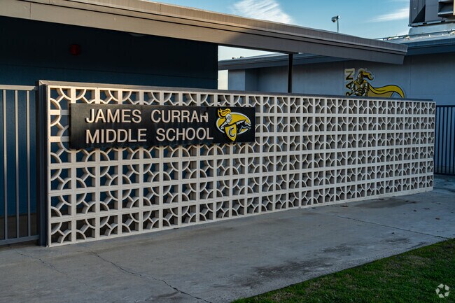 The sign at Curran Middle School welcomes students and staff as they enter the school.