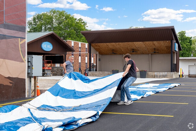 Volunteers help setup for the annual Mascoutah Flower Festival at The Mill.