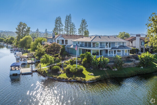 Luxury homes can be found on the island at the center of Westlake Lake.