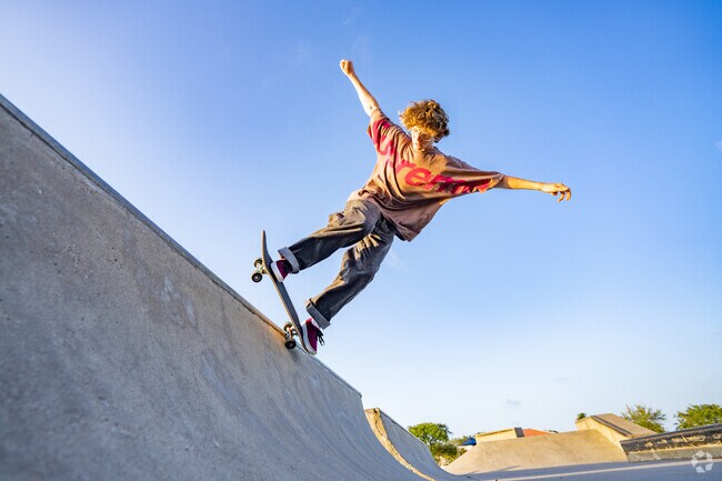 Ingleside resident grinds on the top of a ramp at Ingleside Skate Park.