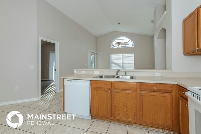 2808 Playing Otter Ct, Kissimmee, FL 34747 - photo 6