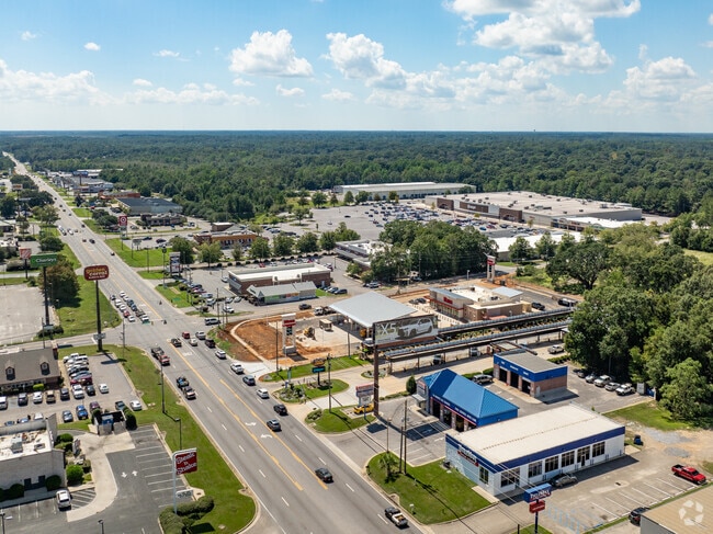 Airport Road is bustling with shopping and dining activity near Millers Creek.
