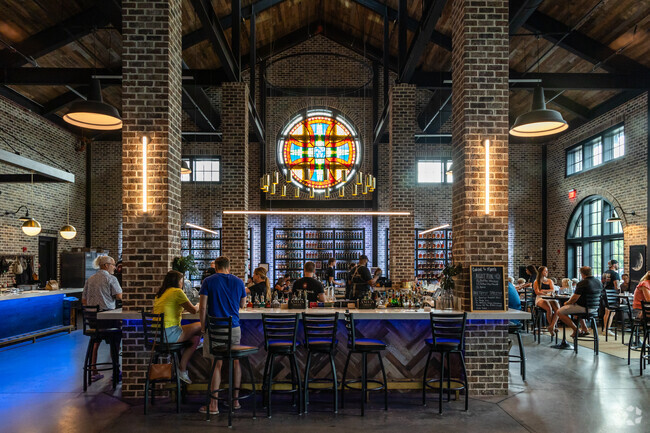 Enjoy an excellent cocktail in a breathtaking space at Burnt Church Distillery near Woodbridge.