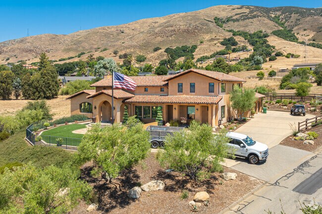 A Spanish Revival style home has a great view of the Orcutt neighborhood.
