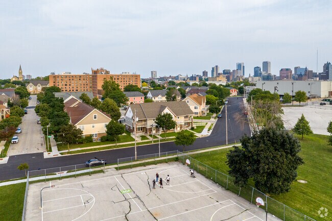 Less than one mile away from Triangle North, many kids play on Carver Park basketball court.