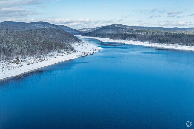 Colebrook River Lake is stocked with bass and trout for year-round fishing.