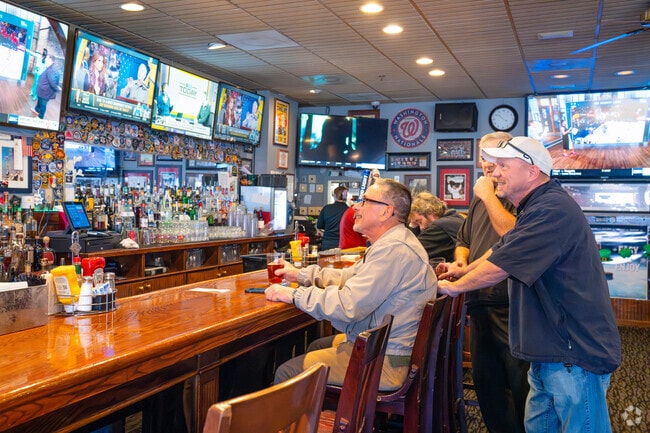 Watch the game at the Sports Pub, just minutes away from Aurora Highlands.