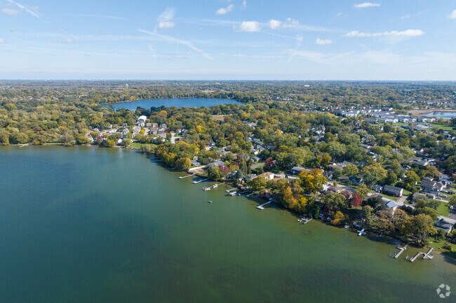 Waterfront properties have private access to Round Lake.