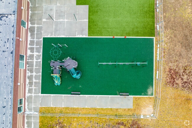 Ashbury Elementary School has playground equipment for the kids.
