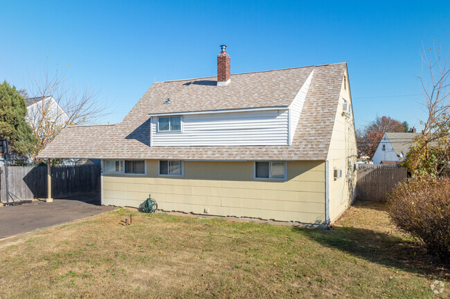 Cape Cod homes are seen throughout the neighborhood of Goldenridge.