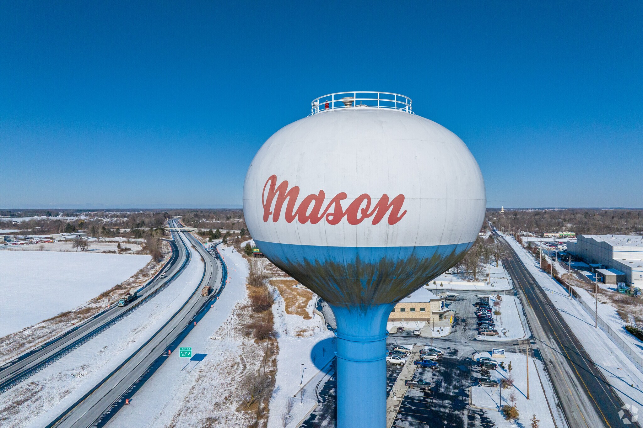 The Mason water tower is visible from the roadway, greeting motorists.