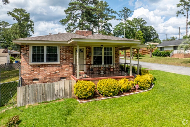 Jones McDonald homes have yards around a quarter-acre or less, shaded by trees.