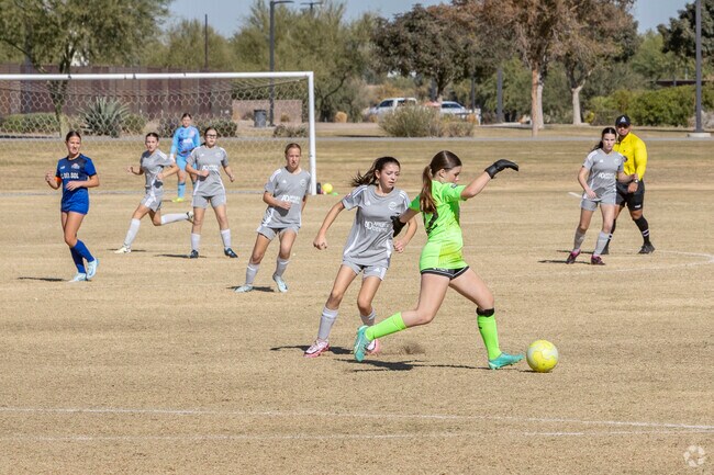Young women play a tough game of soccer at Maricopa’s Copper Sky Regional Park.