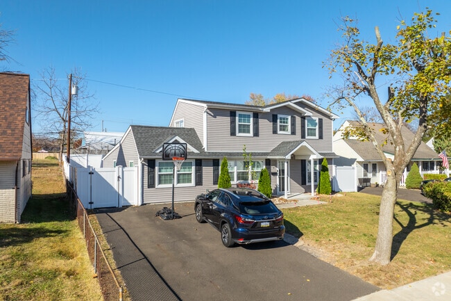 A few Cape Cods have been renovated to include full second stories in Levittown.