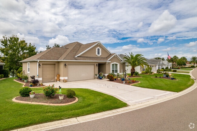 A beautiful row of expensive homes in the Village of Tamarind Grove.