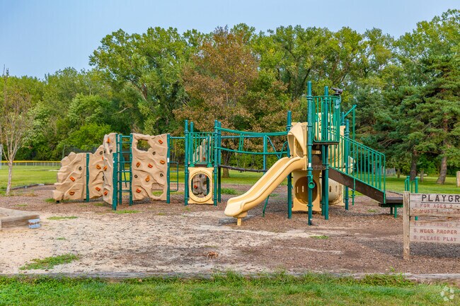 Playground at Tuxedo Park offers space for kids to explore.