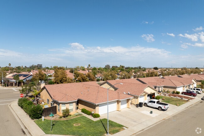 Edges of town bring big‑sky sunsets to Santa Nella homes.
