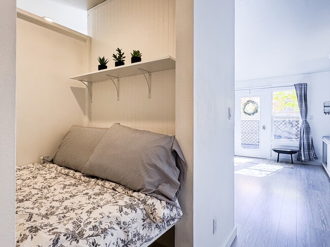 Separated cozy sleep space- unique for a studio!